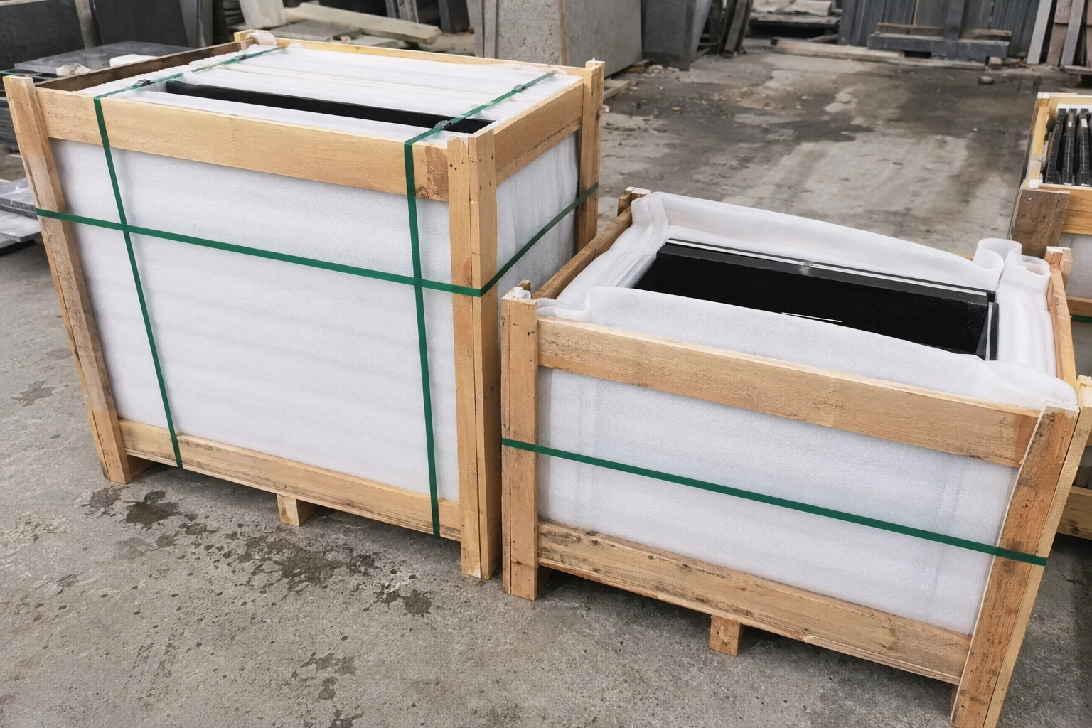 Stone slabs in timber crates with protective padding